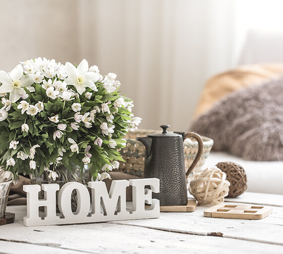 still life in the living room with wooden inscription home, the concept of home comfort